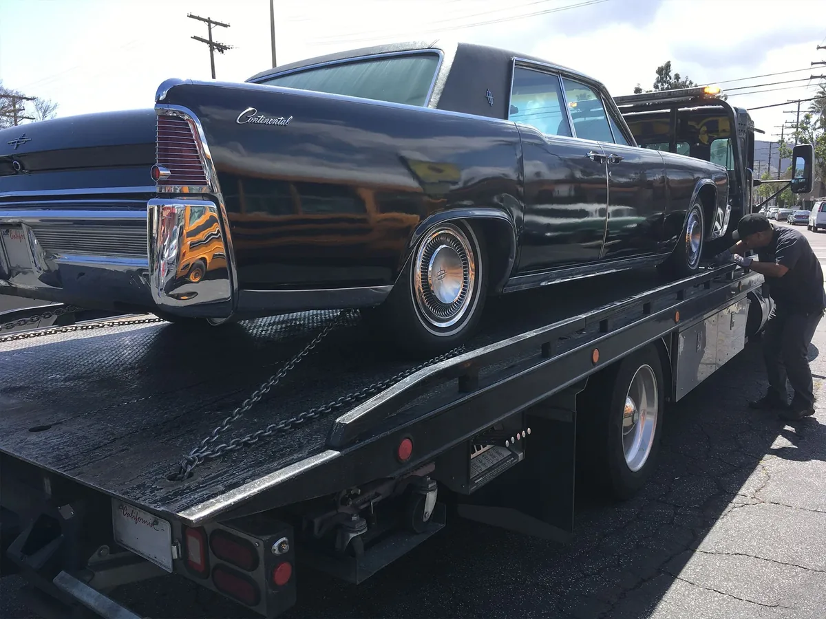 Tow truck outside Fred's Auto Service